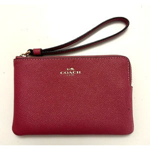COACH corner zip wristlet rose crossgrain leather